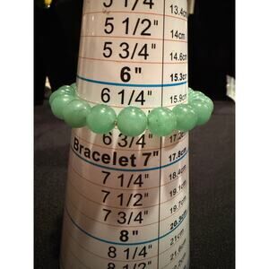 Guatemalan jadeite jade gemstone stretch bracelet, featuring round beads